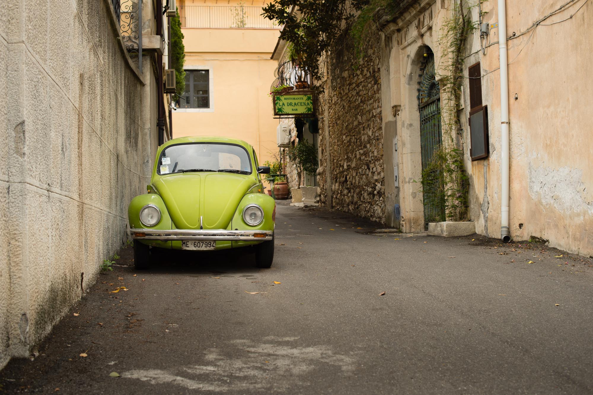 Along the walls towards the car.