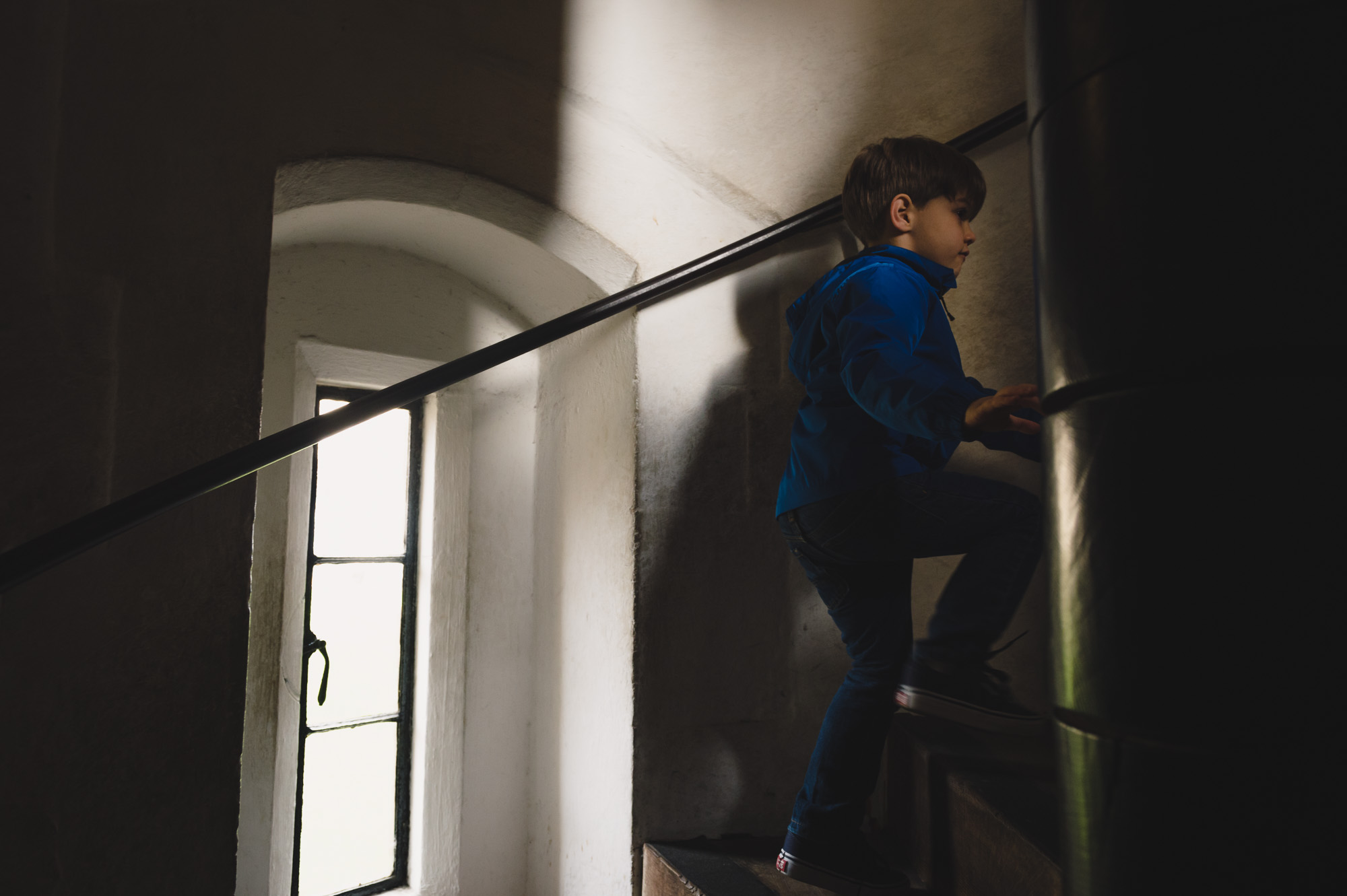 Railing leads toward subject.